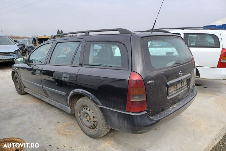 Far stanga Opel Astra G [1998 - 2009] wagon 5-usi 1.7 CDTi MT (80 hp) - 4