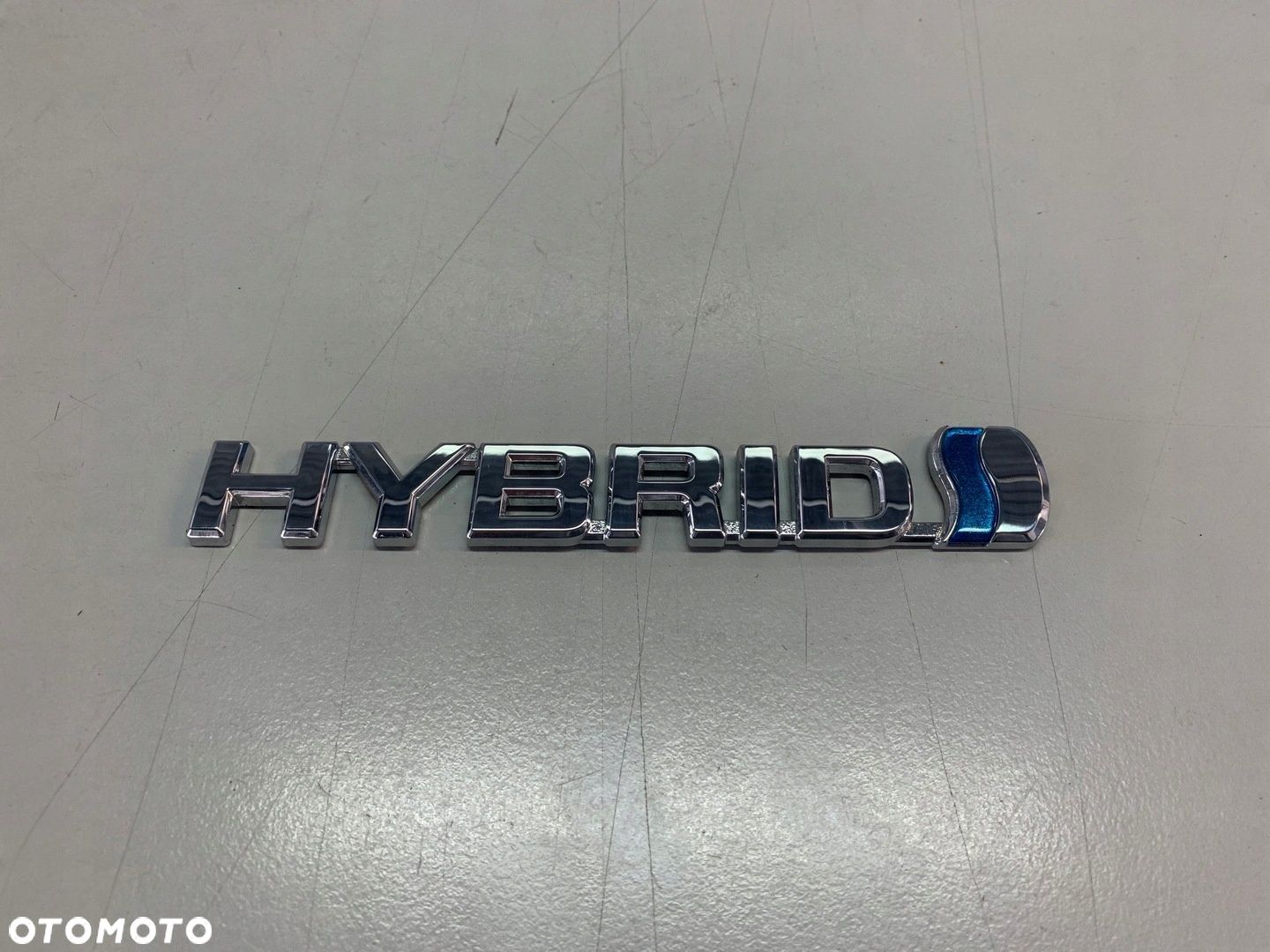 TOYOTA COROLLA E210 18- EMBLEMAT KLAPY TYŁ HYBRID - 1