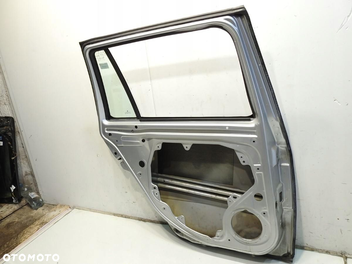 DRZWI LEWY TYŁ 9156 SKODA OCTAVIA II LIFT KOMBI - 9