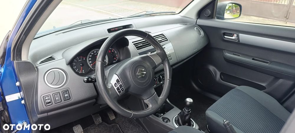 Suzuki Swift 1.3 Club - 12