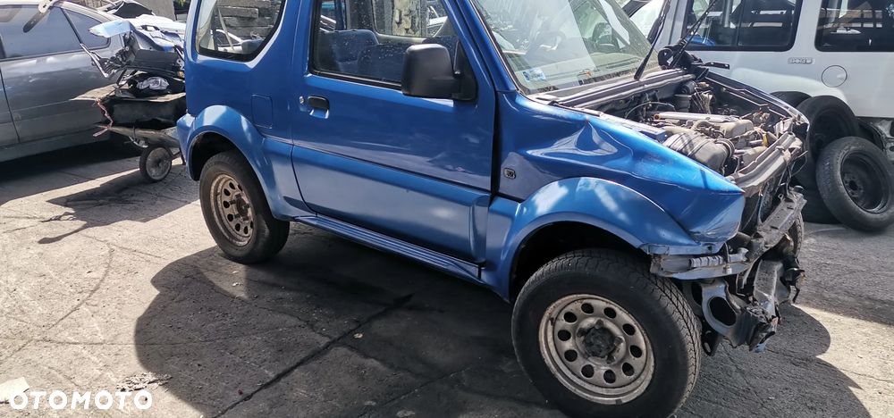 SUZUKI JIMNY  MASKA ZDERZAK KLAPA LAMPY SILNIK SKRZYNIA MOST WAL RESORY - 1