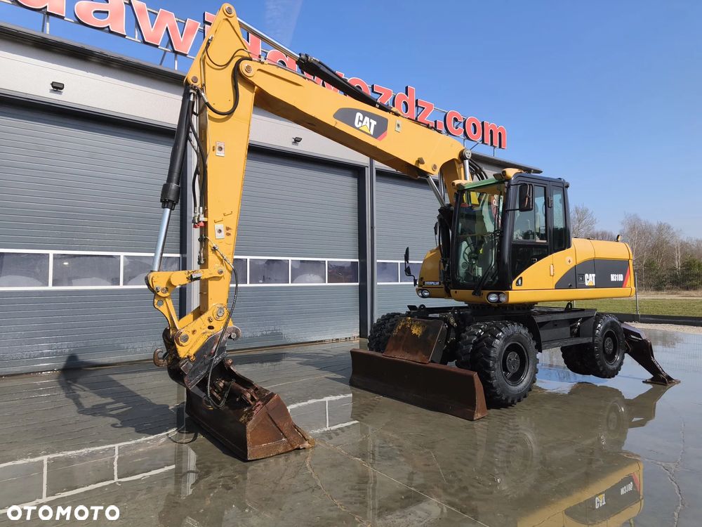 Caterpillar M318D - 4