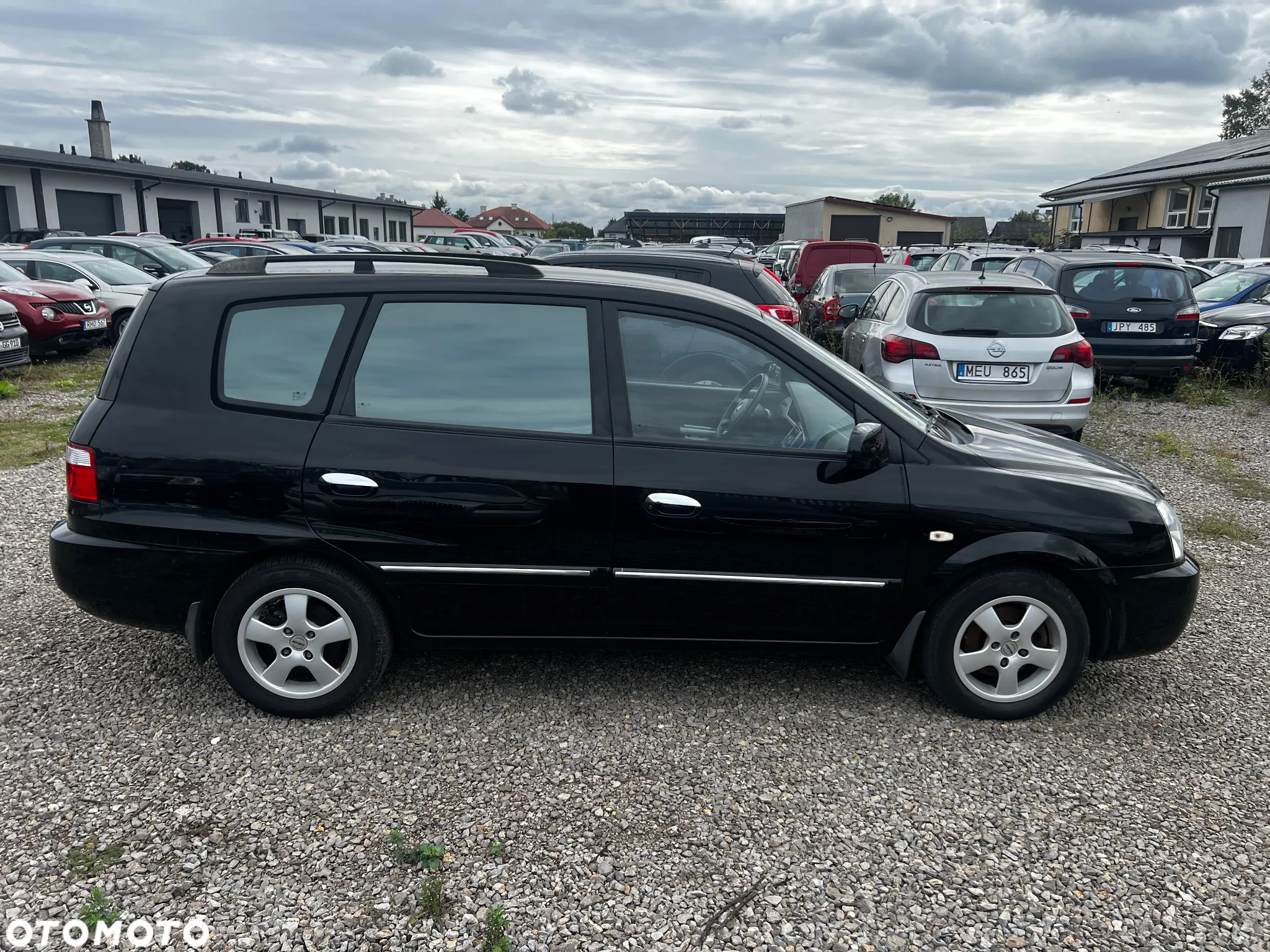 Kia Carens 2.0 EX - 11