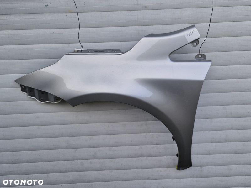TOYOTA AVENSIS T27 LIFT T29 BŁOTNIK LEWY PRZÓD PRZEDNI 1F7 - 1