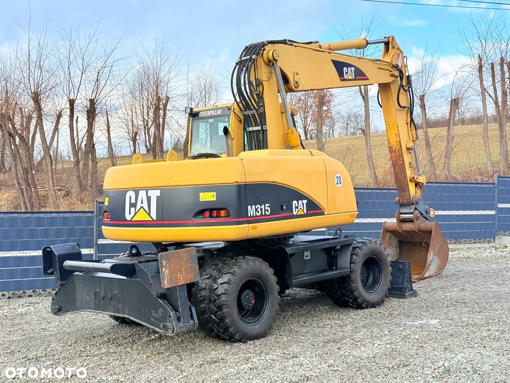 Caterpillar CAT M315C  CATERPILLAR SPROWADZONY  Bardzo Dobry Stan - 21