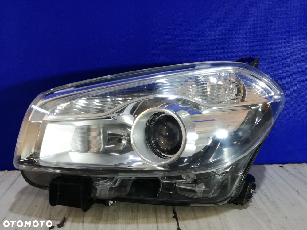 Nissan Qashqai I Lift lampa reflektor lewy Anglik 2009/2012 - 1