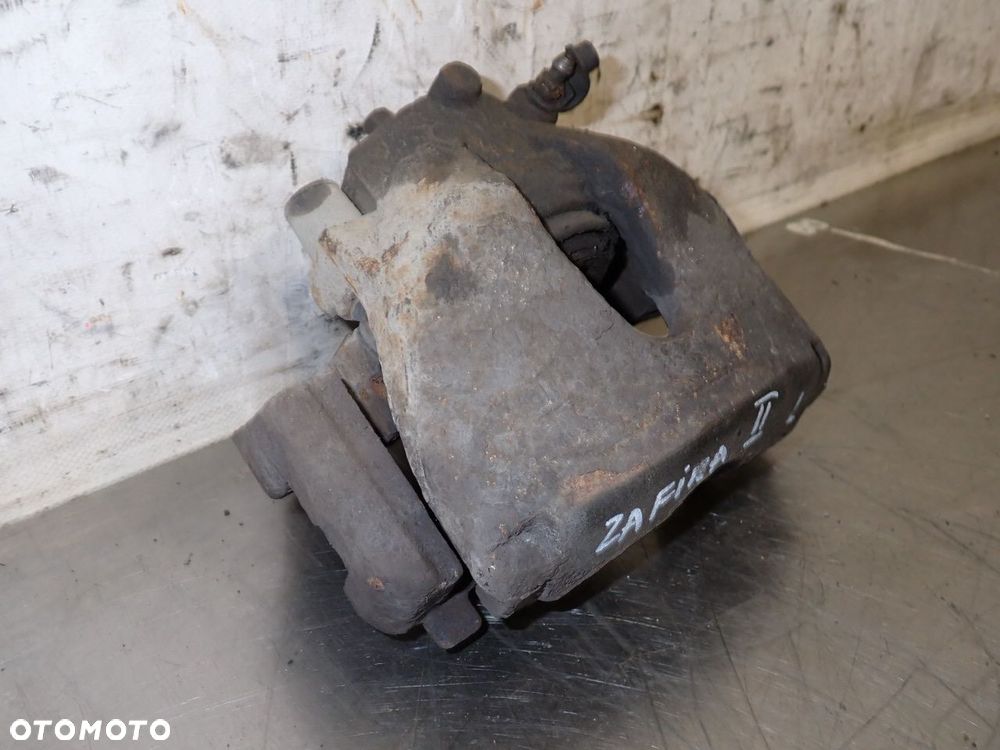 ZACISK HAMULCA LEWY PRZÓD OPEL ZAFIRA B 1.9 - 3