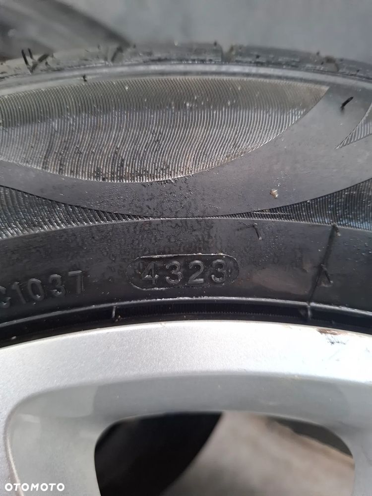 Felgi z kołpakami nowe opony Opel Astra K 5x105 - 9