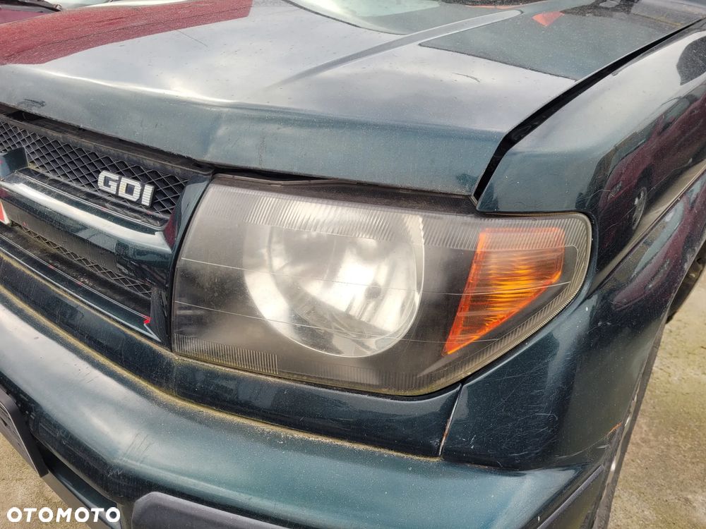 Lampa lewa prawa przód przednia Mitsubishi Pajero Pinin 2000r ciemna Europa - 1