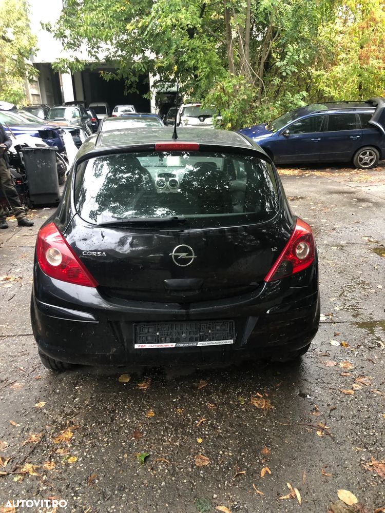 Dezmembrez Opel Corsa D coupe negru benzina 1,2 2007 - 8