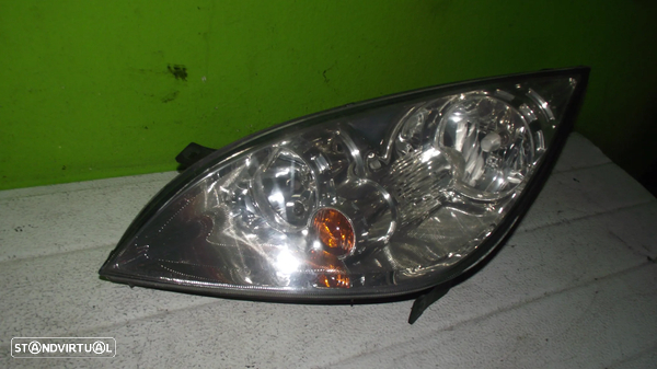 Farol Esquerdo Mitsubishi Colt - 2005 / 2008 - F934