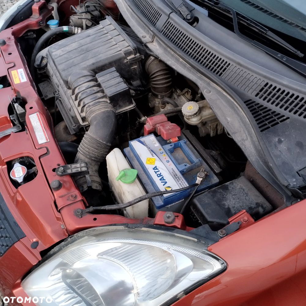 Suzuki Swift 1.3 Sakura - 14