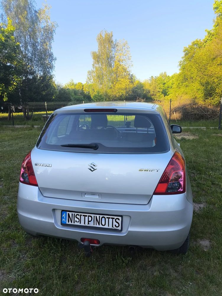 Suzuki Swift 1.3 Club - 4
