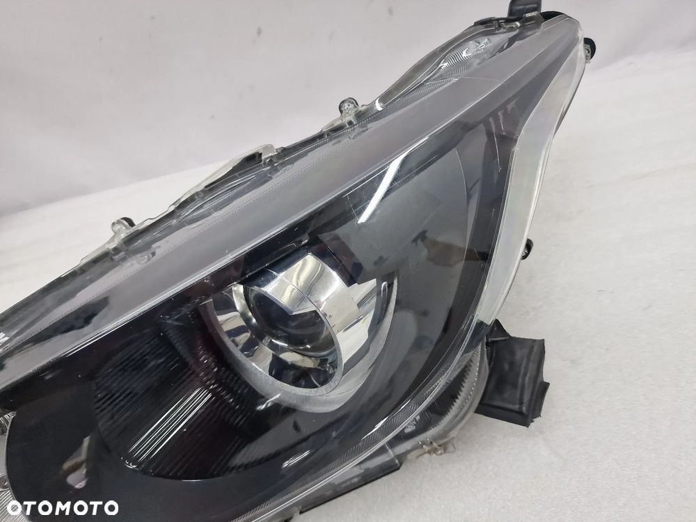 TOYOTA YARIS IV 19- LEWA / PRAWA ZWYKŁA SOCZEWKA LAMPA PRZEDNIA PRZÓD , NR KOITO K0-6 , NR AUKCJI LA47 - 23