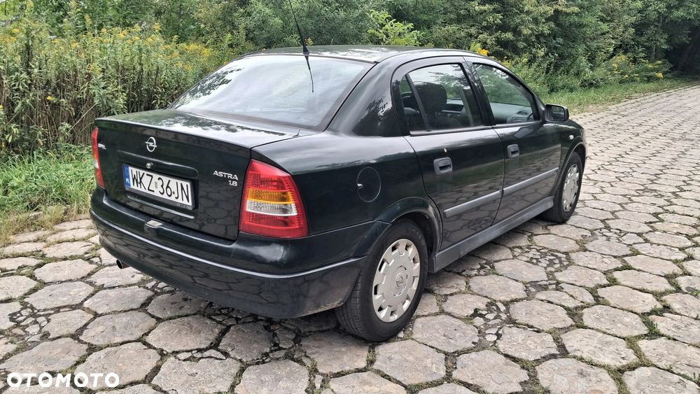 Na części Opel Astra G II SEDAN silnik 1.6 X16XEL Z16XE lakier Z380 skrzynia maska zderzak drzwi klapa szyba fotel kanapa lusterko lampa deska GWARANCJA !!! Przód Tył Zestaw Komplet Drzwi Klapa Zderzak Błotnik Maska Grill Atrapa Szyba Pas Lampa Lusterko Boczki Fotel Kanapa Kokpit Deska Rozdzielcza Przełącznik Włącznik Sterownik Przewody Wiązka Instalacja Moduł Komputer Czujnik Listwa Pompa Alternator Wtryski Głowica Rozrusznik Kompresor Sprzęgło Dwumas Silnik  Skrzynia ABS Klimatyzacji Paliwa Wspomagania Kolektor Turbina Przepustnica Zawór Chłodnica Koło Hak Belka Sanki Zawieszenie Mcpherson Półoś Amortyzator Wydech Tłumik Zacisk Most - 4