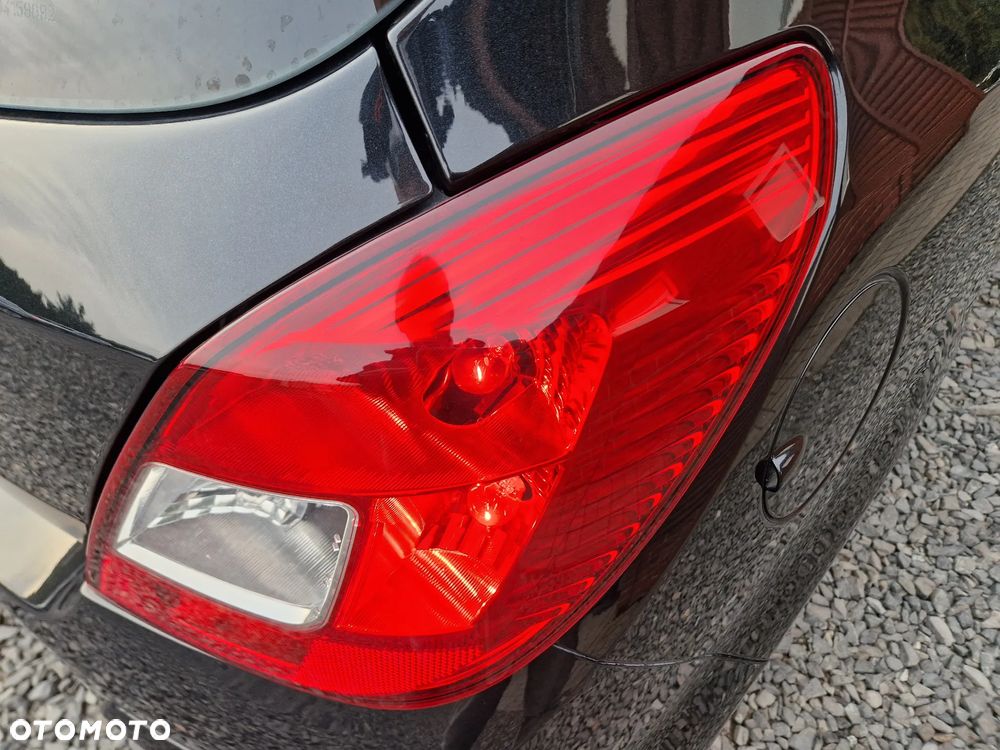 Opel Corsa 1.2 16V Cosmo - 12