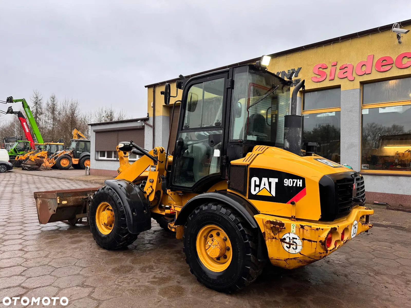 Caterpillar 907H - 11