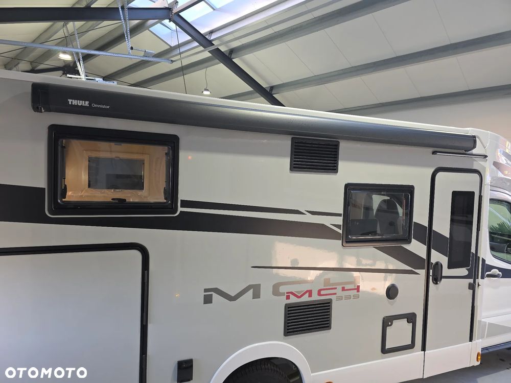 McLOUIS SLIM 339 UKŁAD ŁÓŻEK NIEMIECKICH GARAZ 6,69M 2.0 4 OSOBOWY - 17