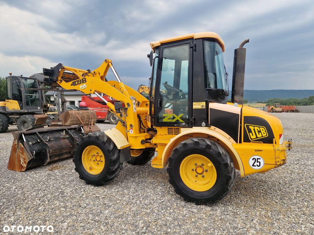 JCB 409 - 6