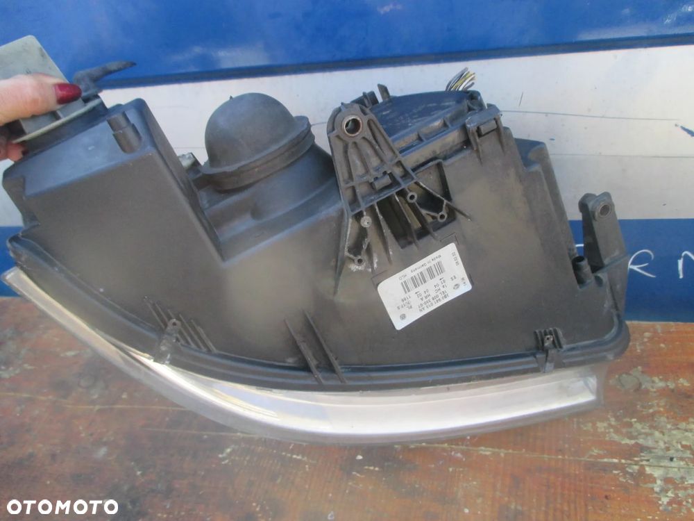 lampa lewa VW Passat B5 lift Hella Europa - 6