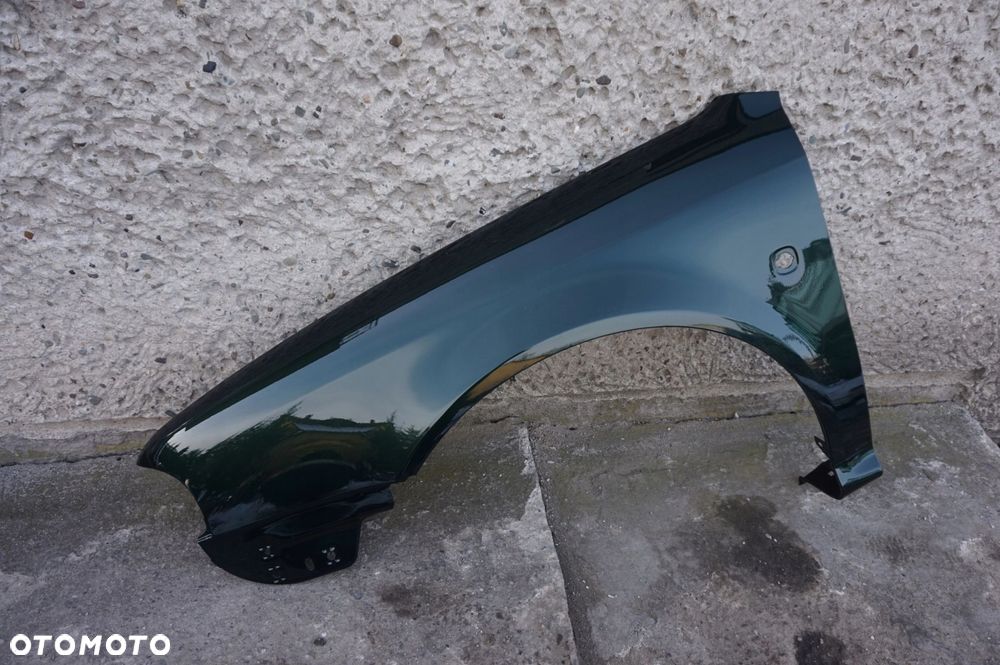 BŁOTNIK LEWY SKODA OCTAVIA I 1 9570