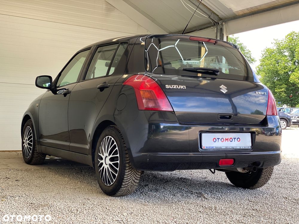 Suzuki Swift 1.3 Club - 4