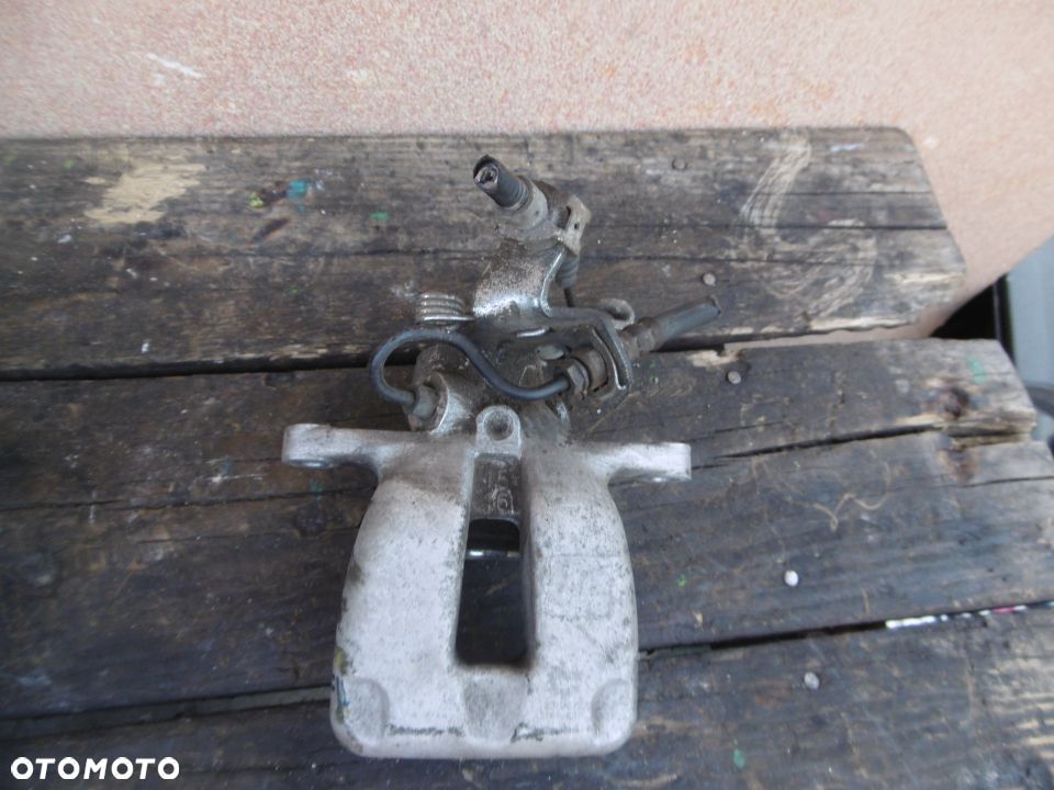 Zacisk tył SKODA OCTAVIA II - 2