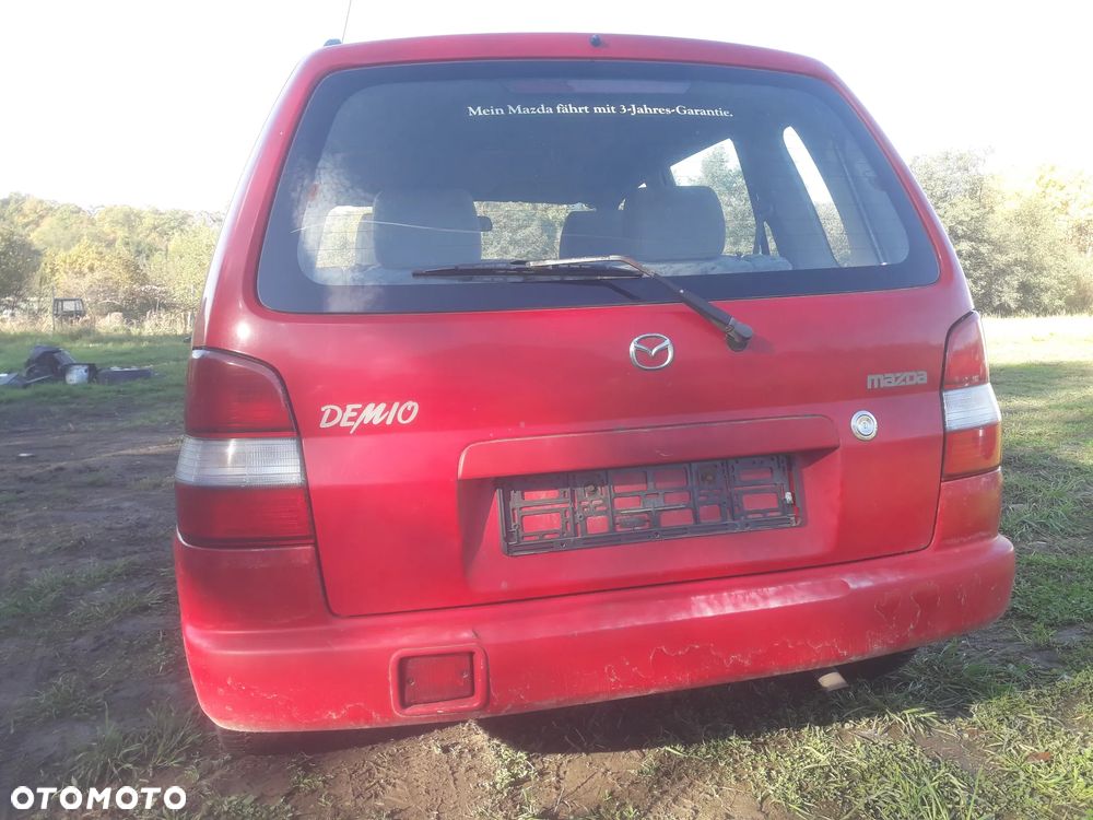 Mazda Demio 97-Klapa Zderzak tylny szybapas  lampa belka Kolor SU - 6