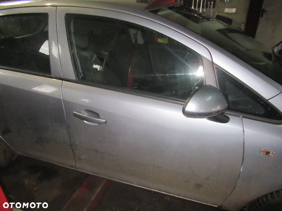 ZAMEK TYŁ PRZÓD PRAWY LEWY OPEL CORSA D - 1