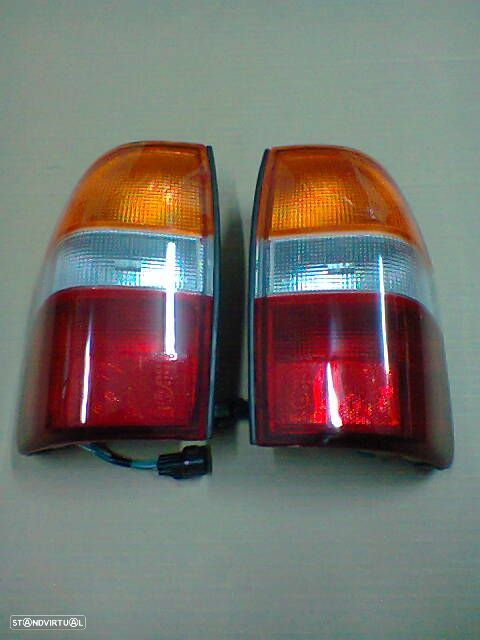 Farolim / Farolins stop Mitsubishi L200 k74 k64 Strakar ( novos ) - 1