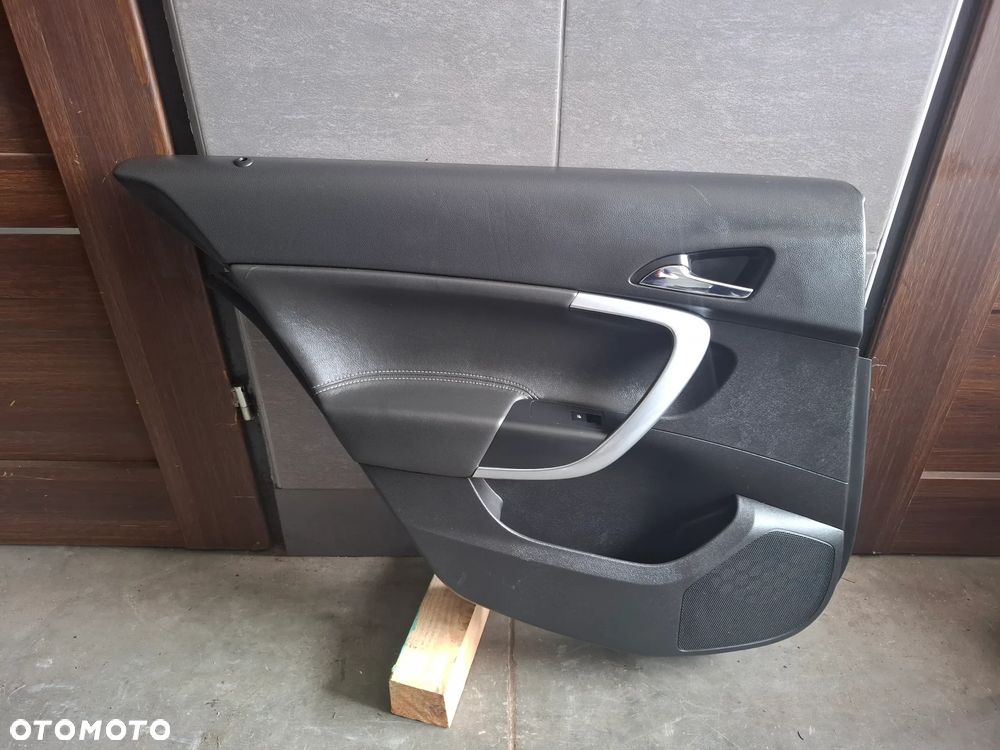 Boczek drzwi Opel Insignia A 2015 rok lewy tył skóra - 1
