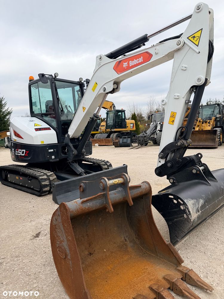 Bobcat Minikoparka Bobcat e50Z 5ton e55 e60 Cat 303.5 304  305 3xłyżki Ramię LOONG dodatkowe linie hydr wyjścia AUX1 + 2 przeciw waga MAX-dociążenie gąsienice 85% od nowości 1 właściciel z Niemiec Auto IDLEE po serwisie Widły wiertnica grabie i inne za dopłatą Szybkozłącze hydr Miller łyżka przedsiębierna Pług  Kubota Takeuchi Jcb - 32