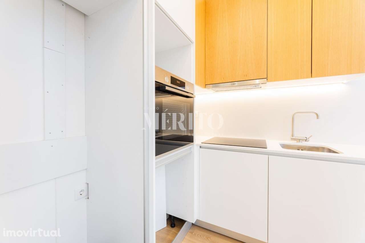 Apartamento T1 Duplex em prédio renovado na zona histórica de Braga - Grande imagem: 4/12