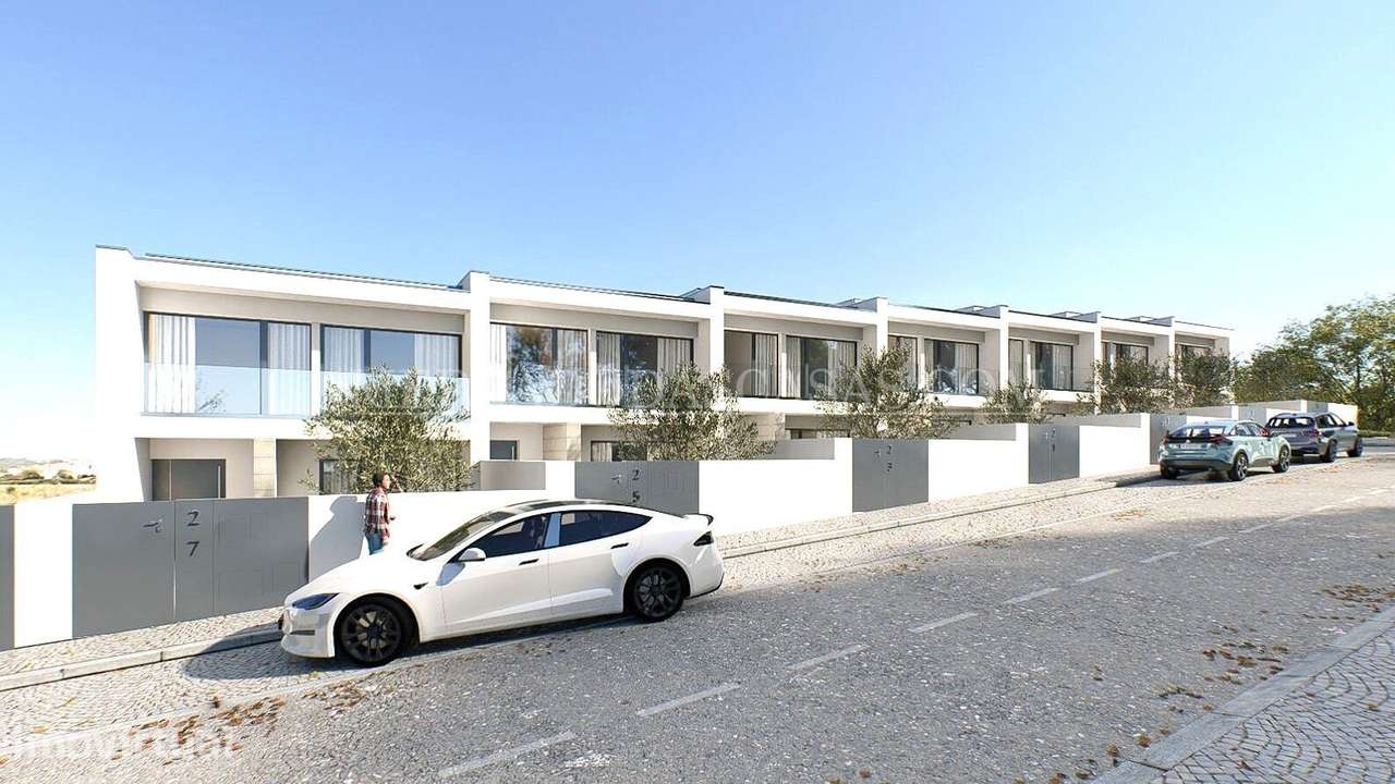 Moradia Geminada com Arquitetura Diferenciada - Grande imagem: 2/15
