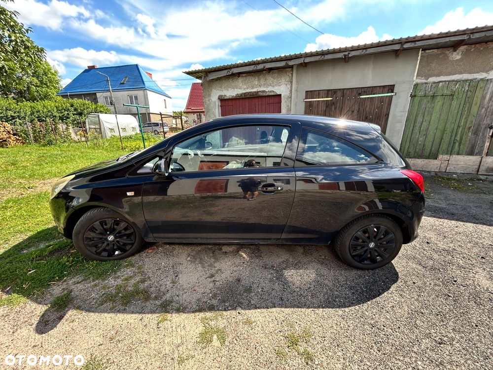 Opel Corsa 1.2 16V Enjoy - 6