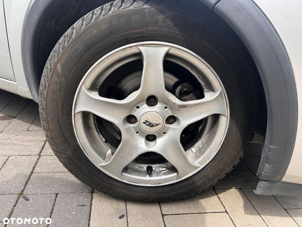 Opel Corsa 1.2 16V Cosmo - 10