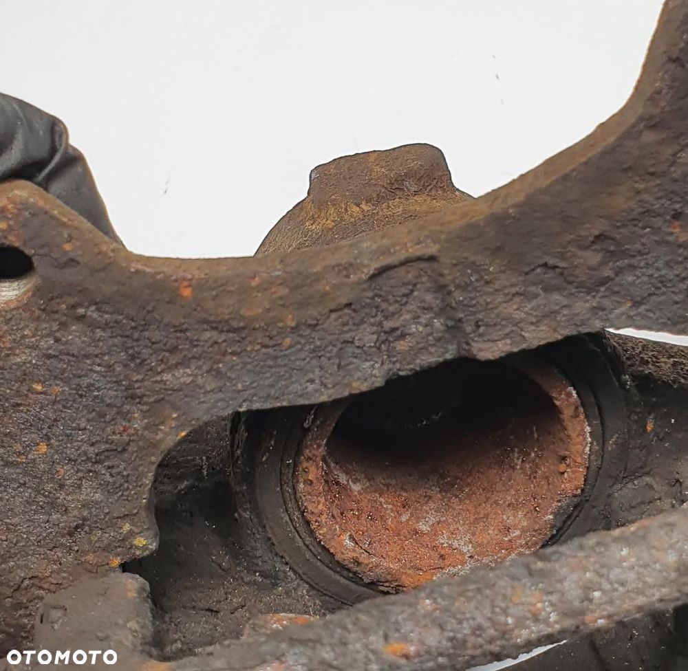 ZACISK HAMULCOWY LEWY PRZÓD PRZEDNI FIAT PANDA II 1.2 8V - 5
