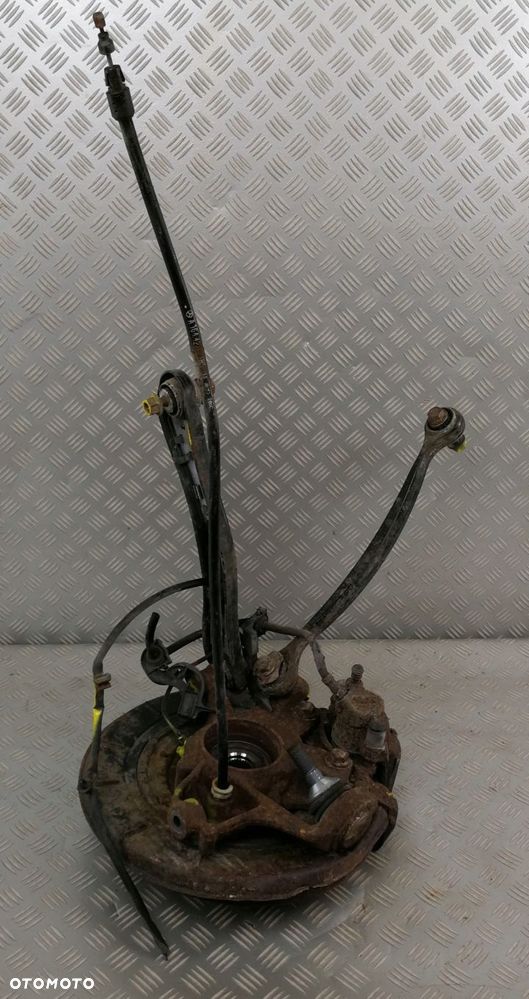 zacisk piasta zwrotnica wahacz lewa lewy tył MERCEDES W164 ML 3,0 CDI - 5