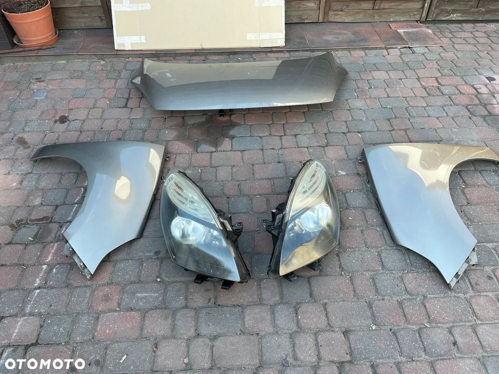 RENAULT SCENIC 3 III  błotnik LAMPA LEWA   KOD TEHNK drzwi - 1