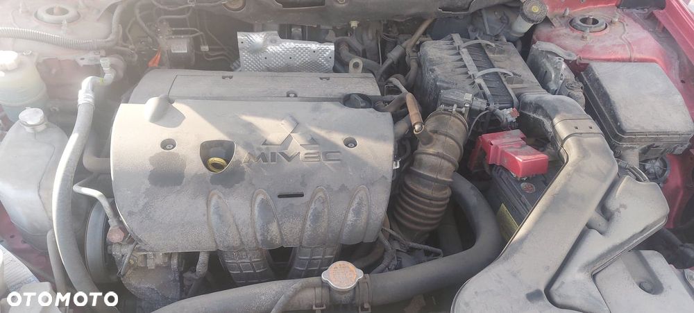 Mitsubishi Lancer x 1,8 alternator - 1