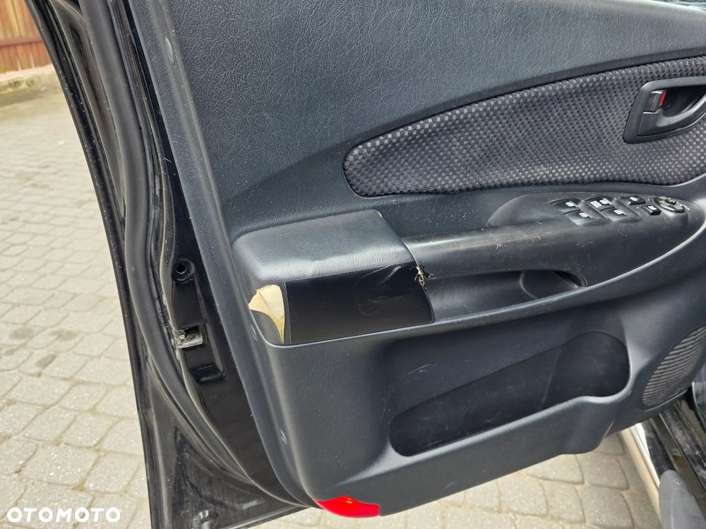 Hyundai Tucson 2.0 Comfort 2WD - 7