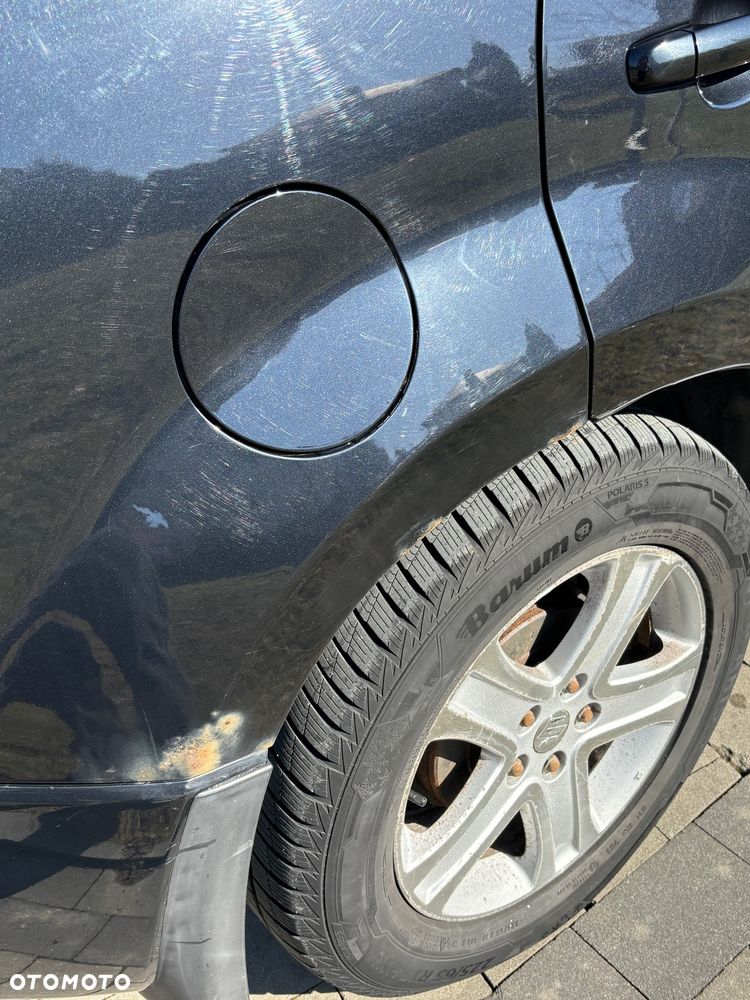 Suzuki Grand Vitara 2.0 De luxe - 9