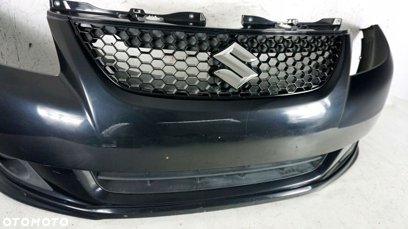 ZDERZAK PRZÓD PRZEDNI SUZUKI SX4 06-09 SEDAN 2006-2009 ZJ3 C04 71711-75K - 2