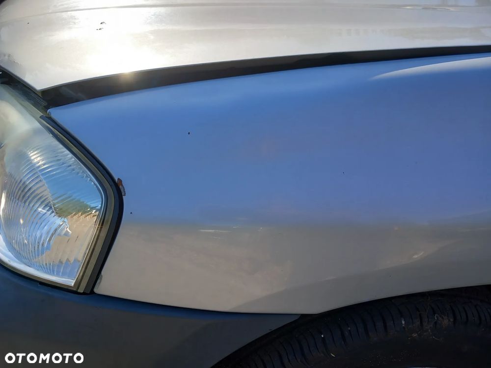 MAZDA TRIBUTE BŁOTNIK LEWY PRZEDNI LEWY PRZÓD - 2