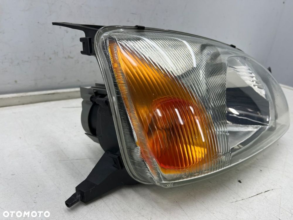 Lampa reflektor Ford Fiesta IV MK4 LIFT 99-02r. prawa przednia Europa oryginal Bosch - 2