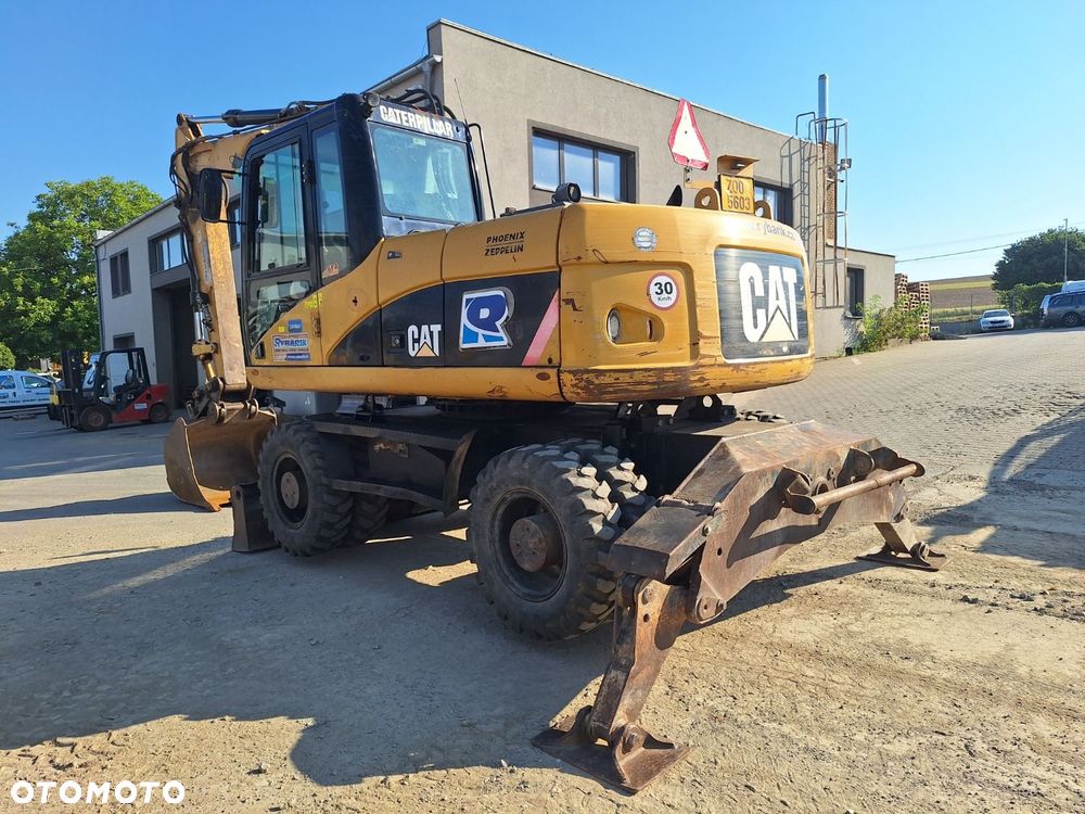 Caterpillar M315D 4X4 - 7