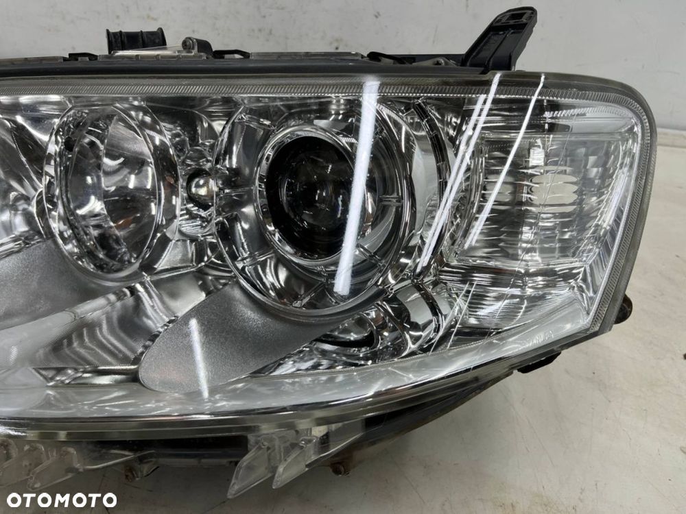 Lampa reflektor Mitsubishi L200 LIFT 10-15r. Pajero Sport II 03-16r. LEWA przednia soczewka EUROPA - 8