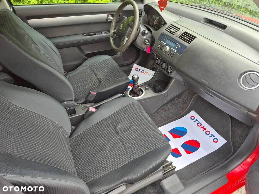 Suzuki Swift 1.3 Club - 8