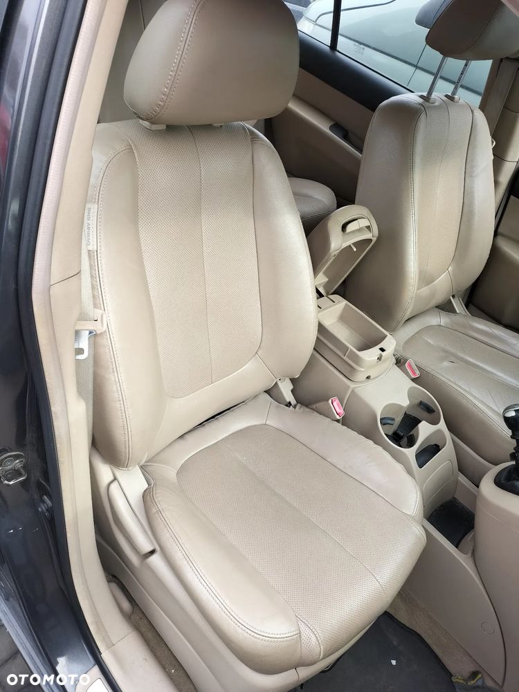CAŁE AUTO NA CZĘŚCI KIEROWNICA LAMPY TYŁ RADIO ITP KIA CARENS III 06-12r KOD LAK. 1U - 16