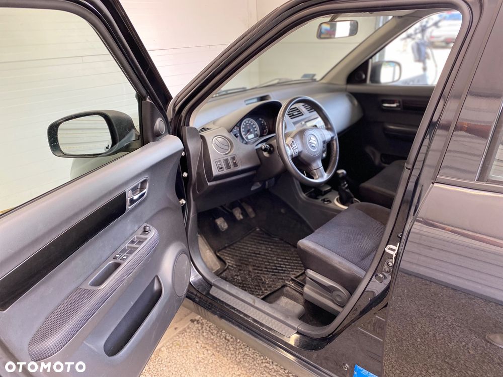 Suzuki Swift 1.3 Club - 8